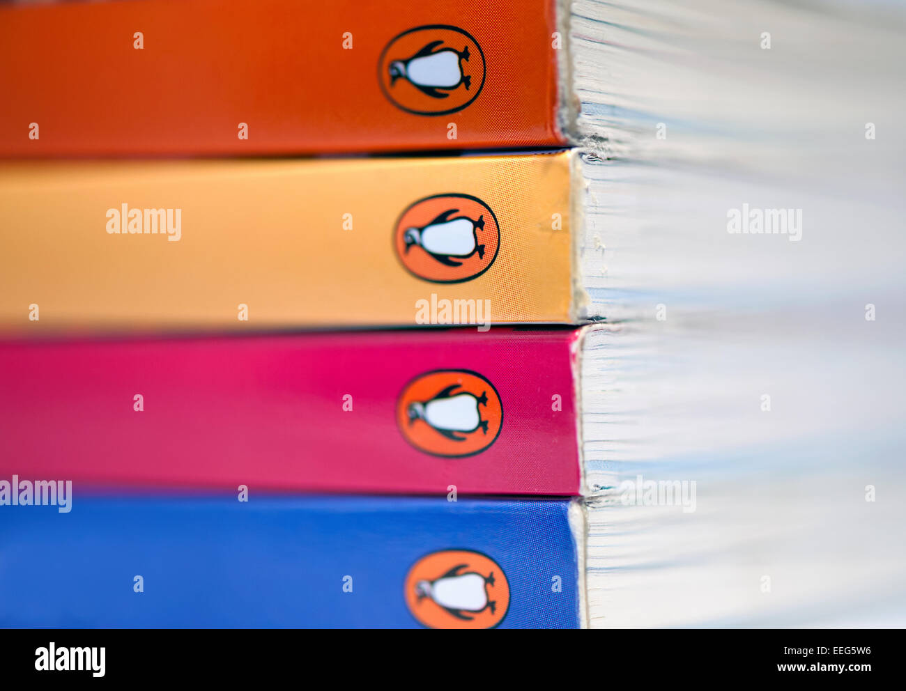 Stack of four colourful Penguin books Stock Photo