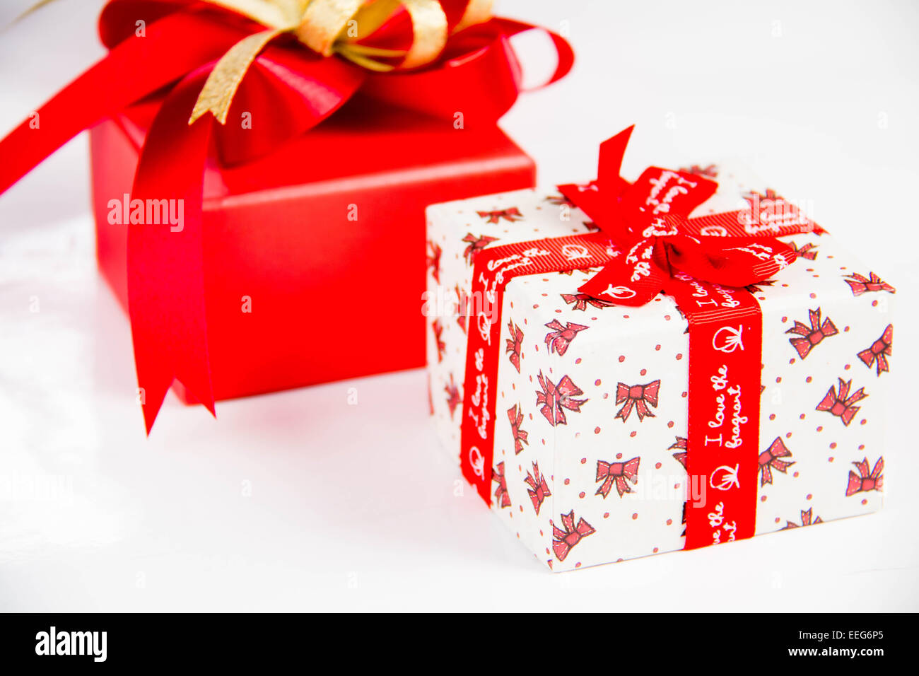 Gold gift box with ribbon and bow isolated on white background Stock ...