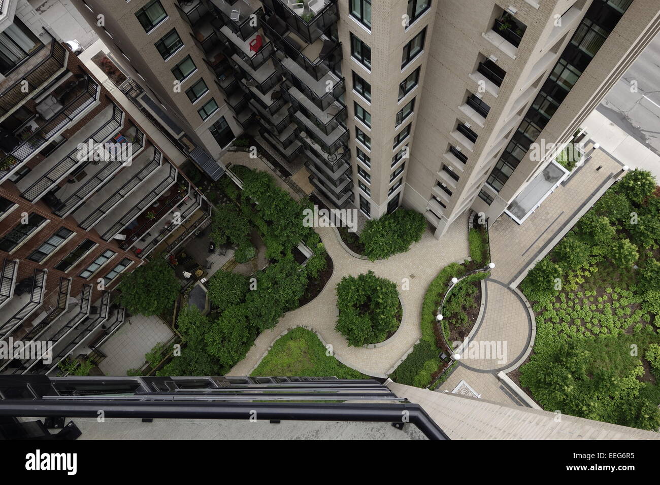 View of court yard from the balcony,life in apartment,designated space,clean,tidy,city living,happy home, Stock Photo