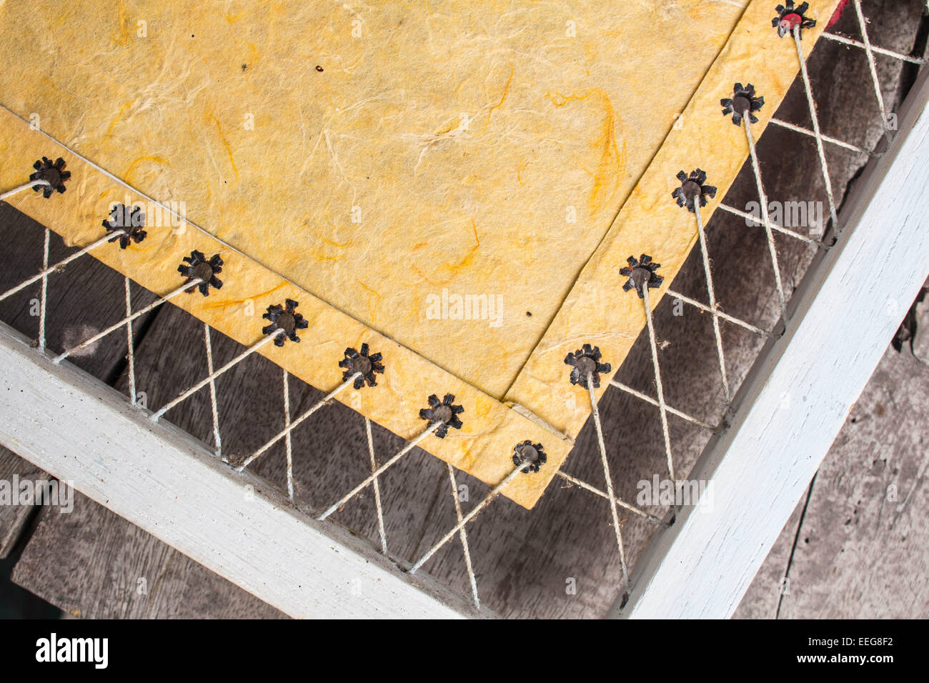 Background paper on a frame and string Stock Photo - Alamy