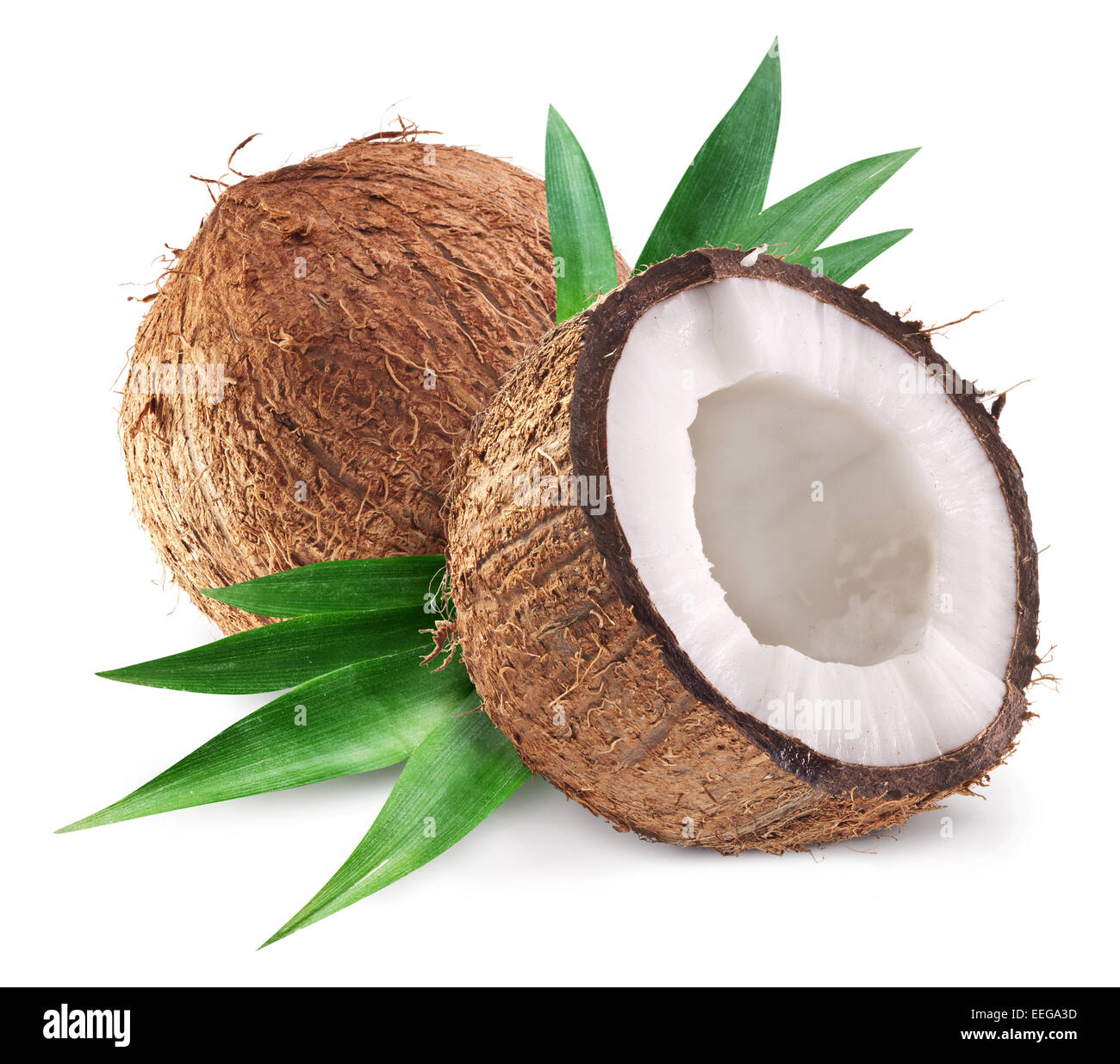 Coconuts and it's half with leaves. File contains clipping paths. Stock Photo
