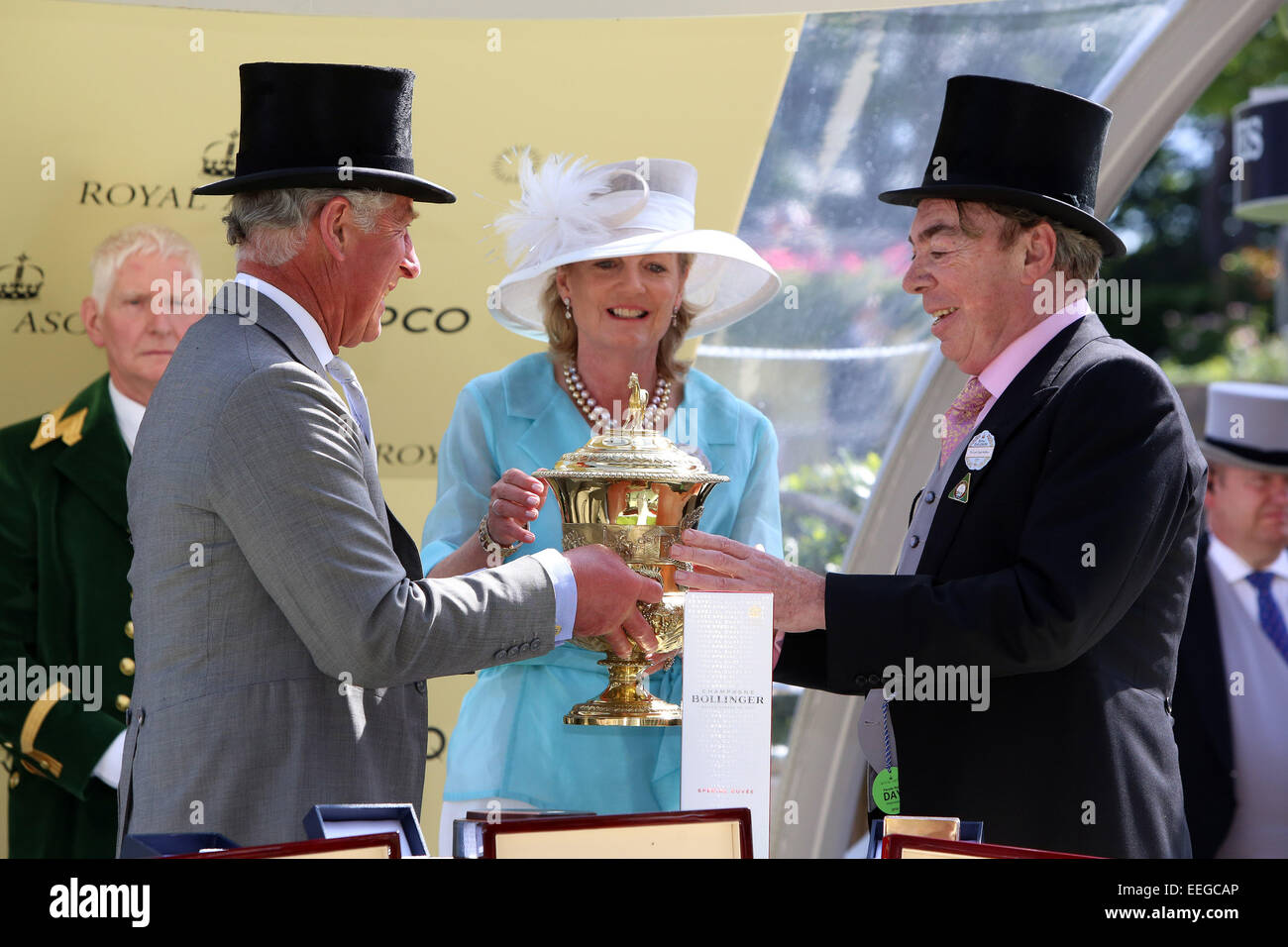 Prince Charles gives trophy to owner Sir Andrew Lloyd Webber after The Fugue with William Buick won the Prince of Wales's Stakes Stock Photo