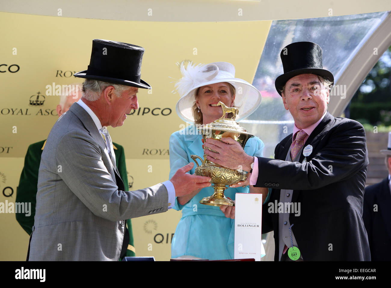 Prince Charles gives trophy to owner Sir Andrew Lloyd Webber after The Fugue with William Buick won the Prince of Wales's Stakes Stock Photo