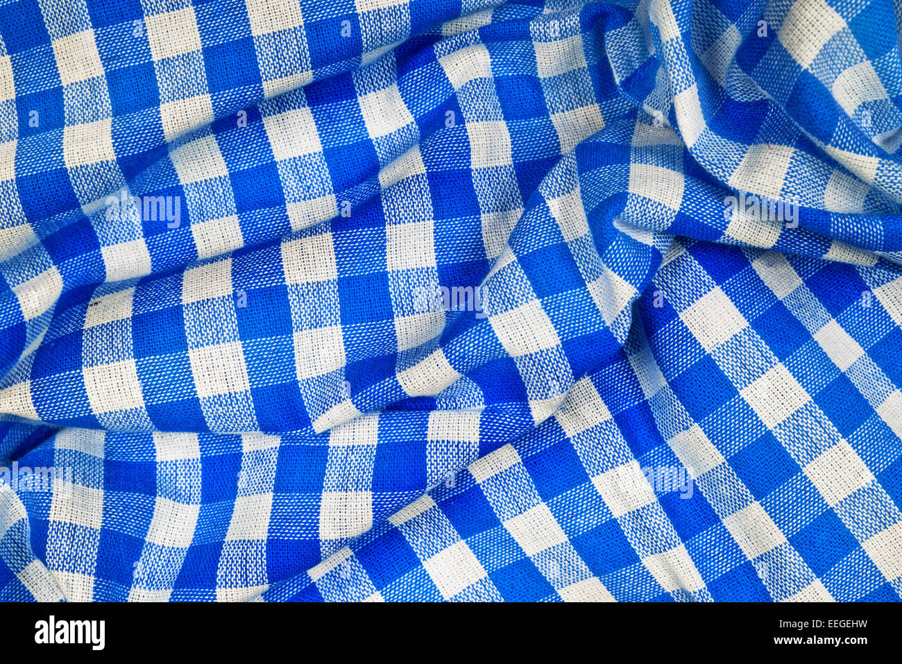 Blue and white wrinkled checkered Bavarian tablecloth pattern texture