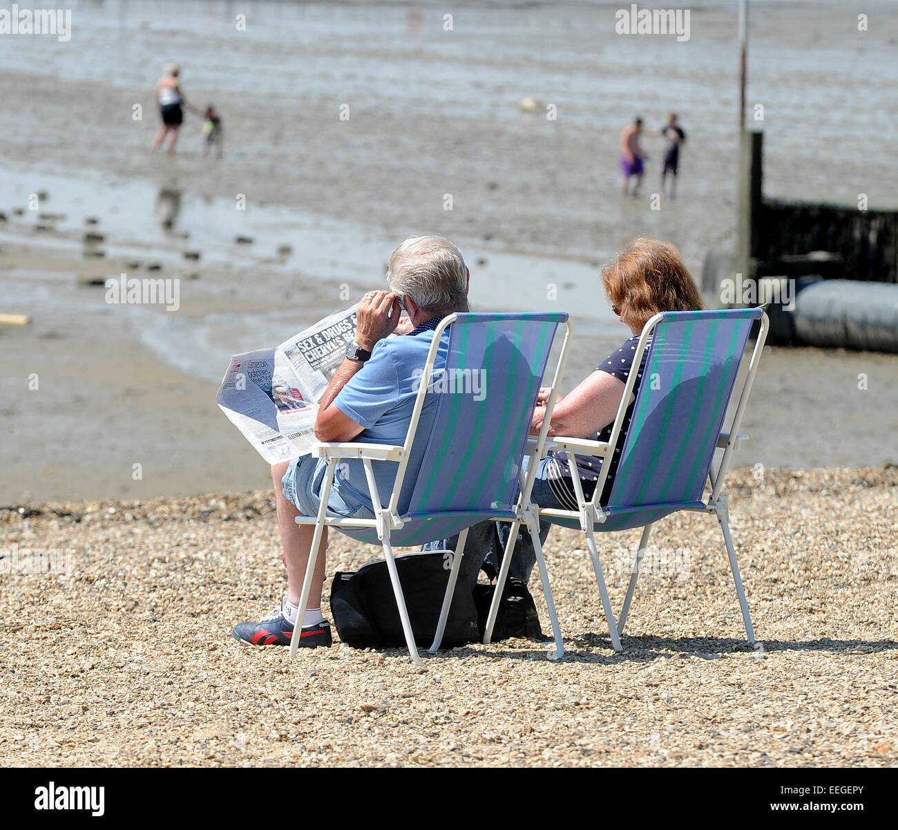 Members of the public enjoy the hot weather on Southend Beach  Featuring: Atmosphere Where: London, United Kingdom When: 16 Jul 2014 Stock Photo