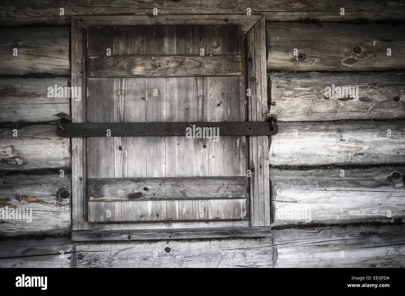Old wooden window shutters closed, close-up Stock Photo