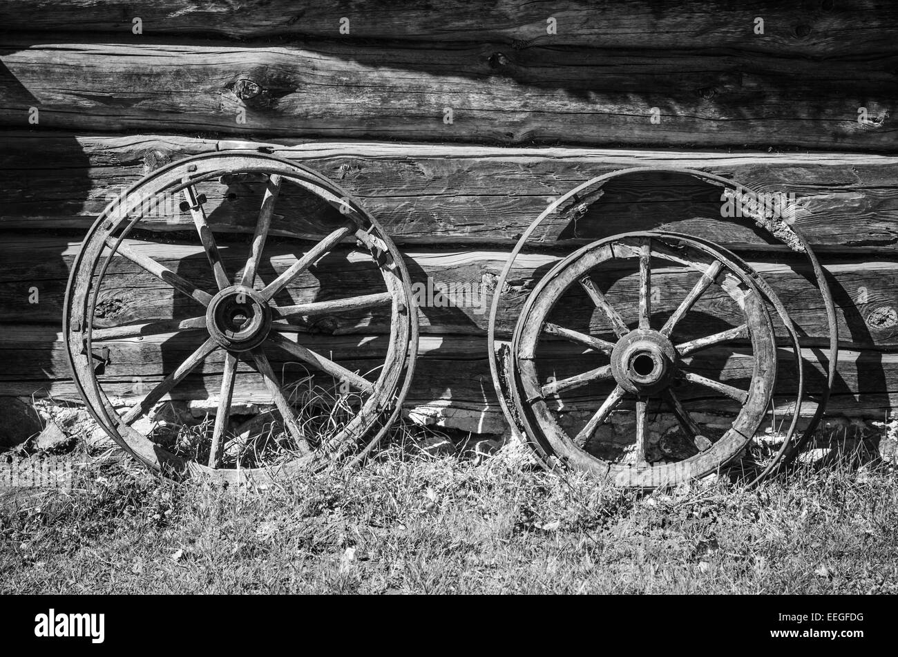 Old wheel from carts in the countryside Stock Photo