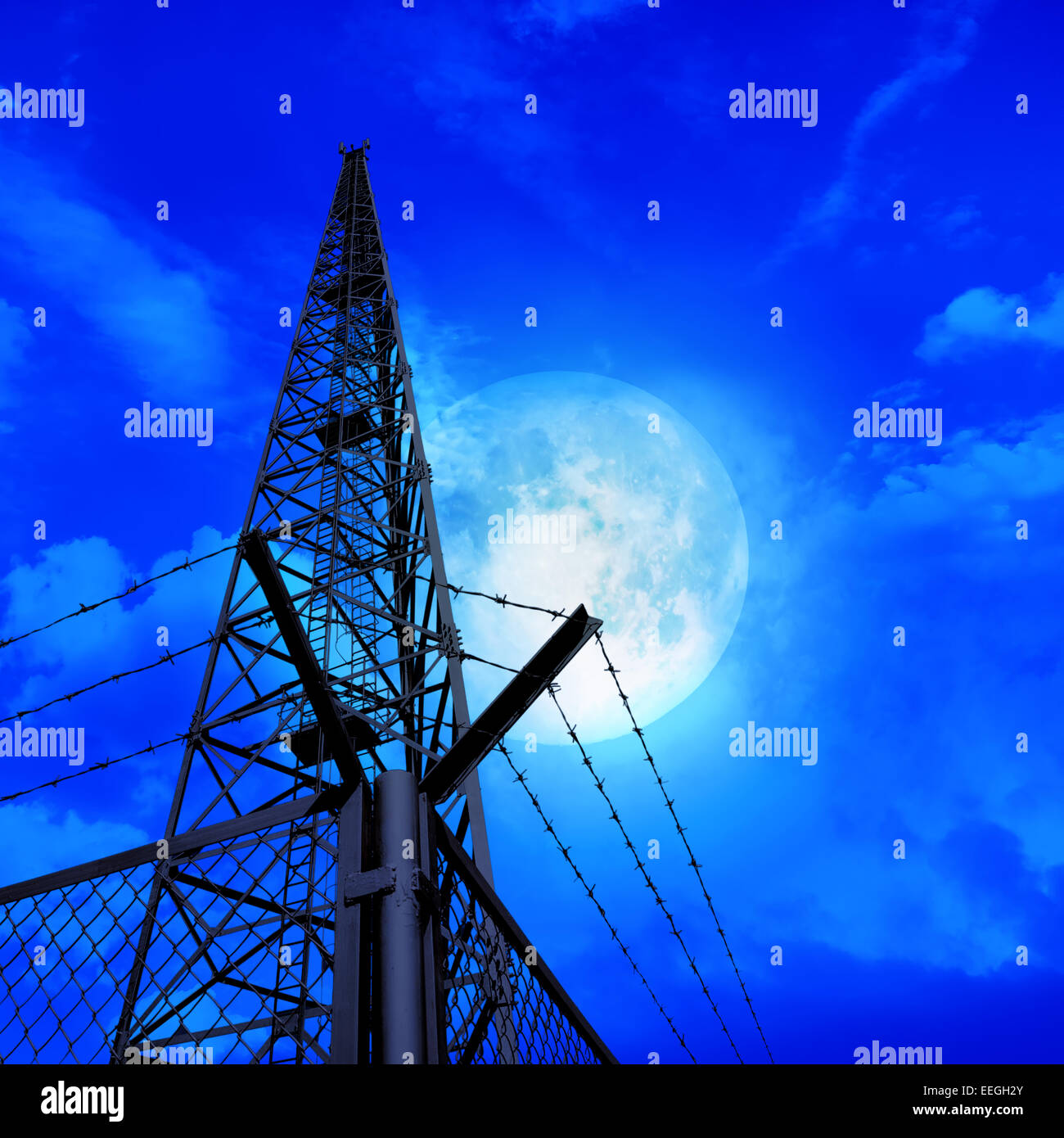 Communications tower with radio, phone transmitters and receivers Stock