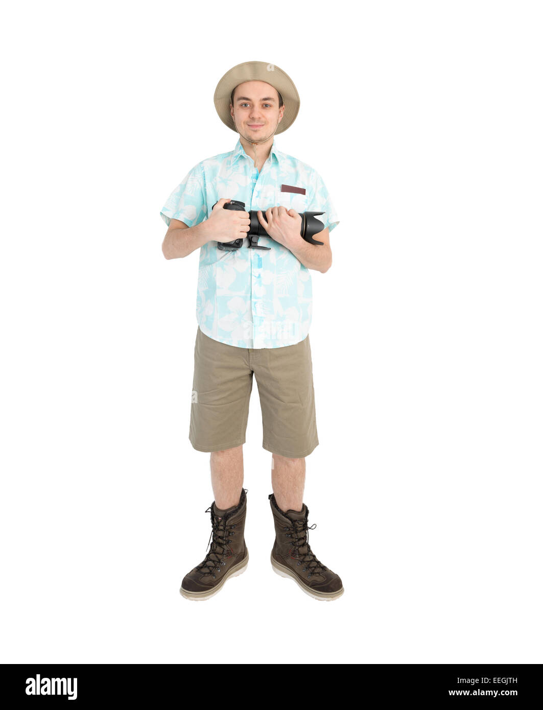 Happy man tourist in blue shirt brown shorts and hat with dslr camera. Traveler going to photo tour. Isolated on white backgroun Stock Photo
