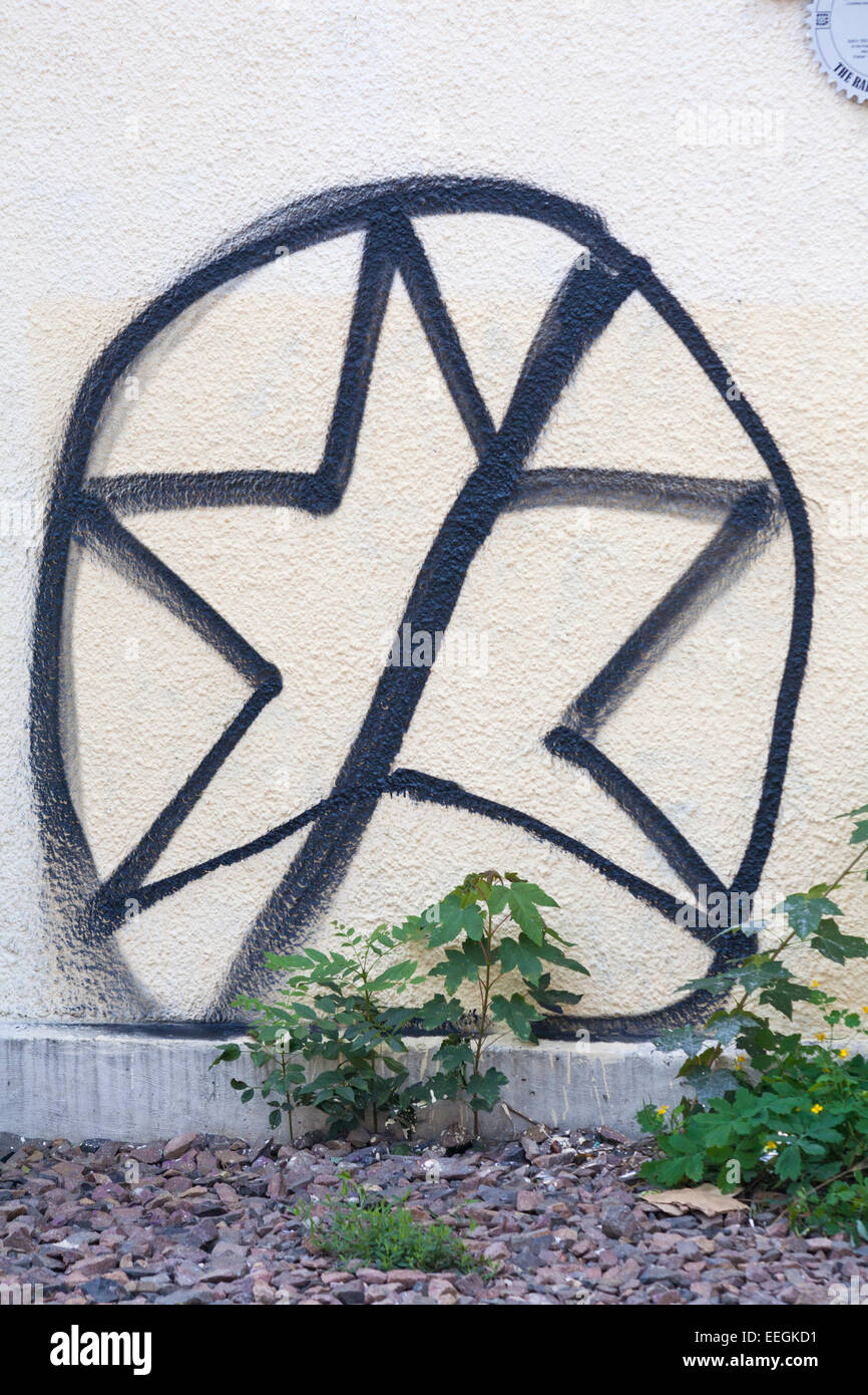 Anti-semitic graffiti on a wall in the Jewish Quarter of Kazimierz at Krakow, Poland.in September - anti-semitism antisemitism anti semitism Stock Photo