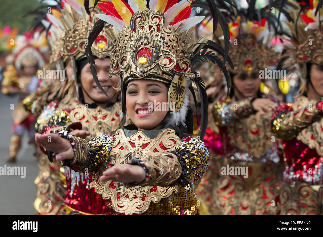 Cebu City, Philippines. 18th Jan, 2015. One of the largest festivals in the Philippines takes place over a nine day period in January. Celebrating the Catholic belief in the Jesus child Santo Nino, various religious ceremonies are held culminating in the Sinulog Grande Parade,a procession of street dancing throughout the City. Credit:  imagegallery2/Alamy Live News Stock Photo