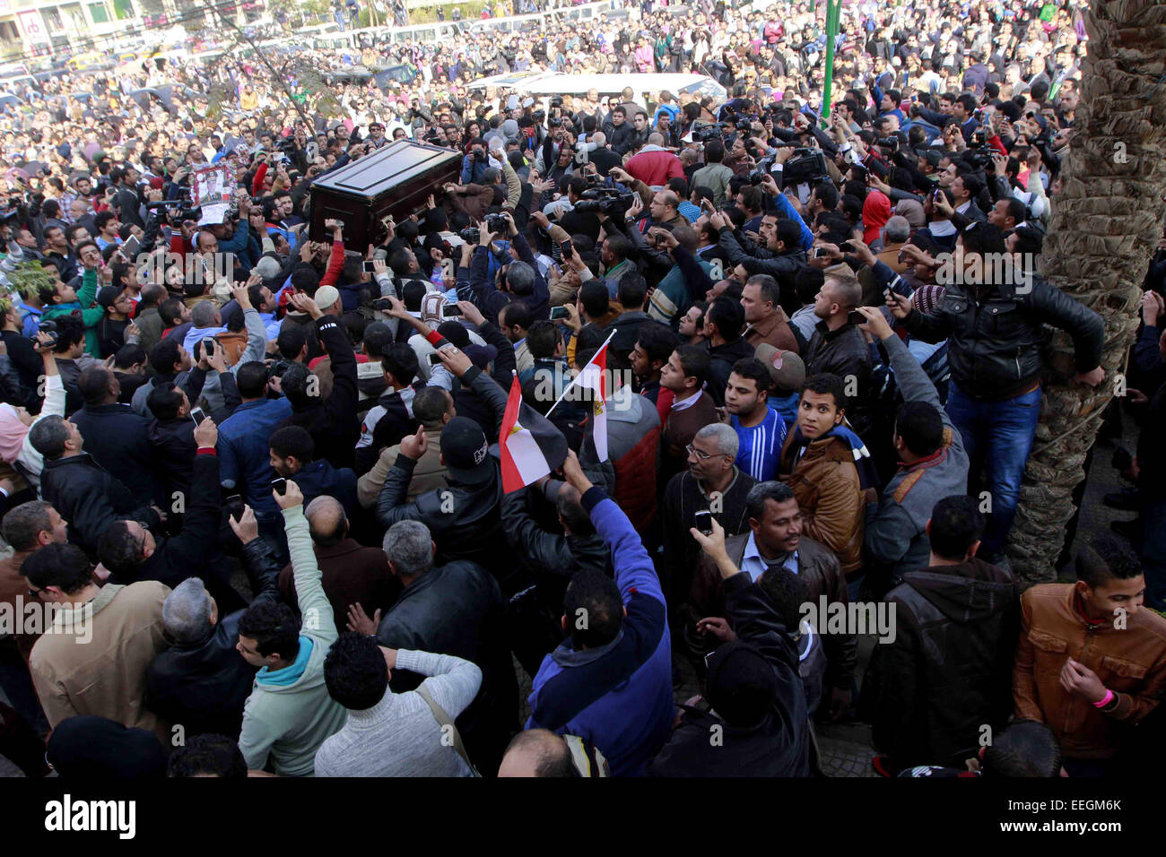 Cairo, Egypt. 18th Jan, 2015. Mourners carry the coffin of Egyptian actress Faten Hamama during her funeral in 6th of October City on the outskirts of Cairo on January 18, 2015. Hamama, an Arab film icon and Omar Sharif's former wife, died on January 17, 2015 at the age of 83, their son Tarek Sharif said. Hamama, who was less than 10 when she made her screen debut, appeared in almost 100 films and worked with masters of Egypt's massive film industry, including Youssef Chahine Credit:  Amr Sayed/APA Images/ZUMA Wire/Alamy Live News Stock Photo