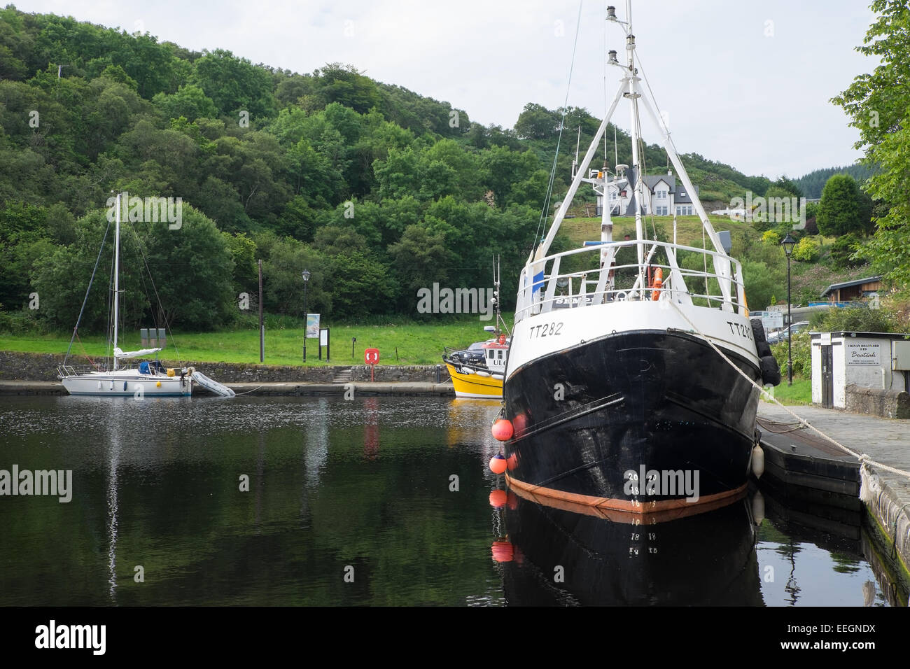 Boats in the basin at the end of the Crinan Canal, Scotland. Stock Photo