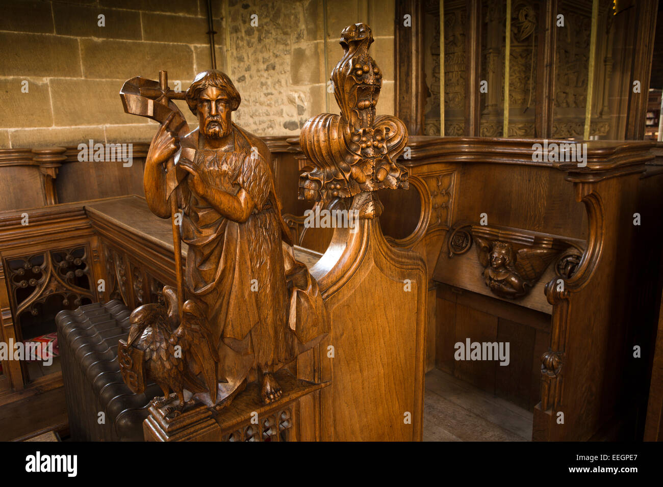 UK, Derbyshire, Tideswell, Church of St John the Baptist, carved choir chancel pew end by Tooley of Suffolk Stock Photo