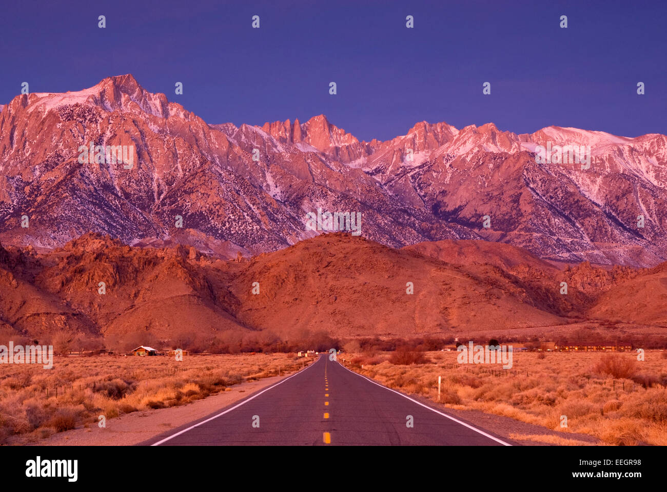 Alpenglow over Mount Whitney and Lone Pine Peak in Eastern Sierra Nevada near Lone Pine, California, USA Stock Photo