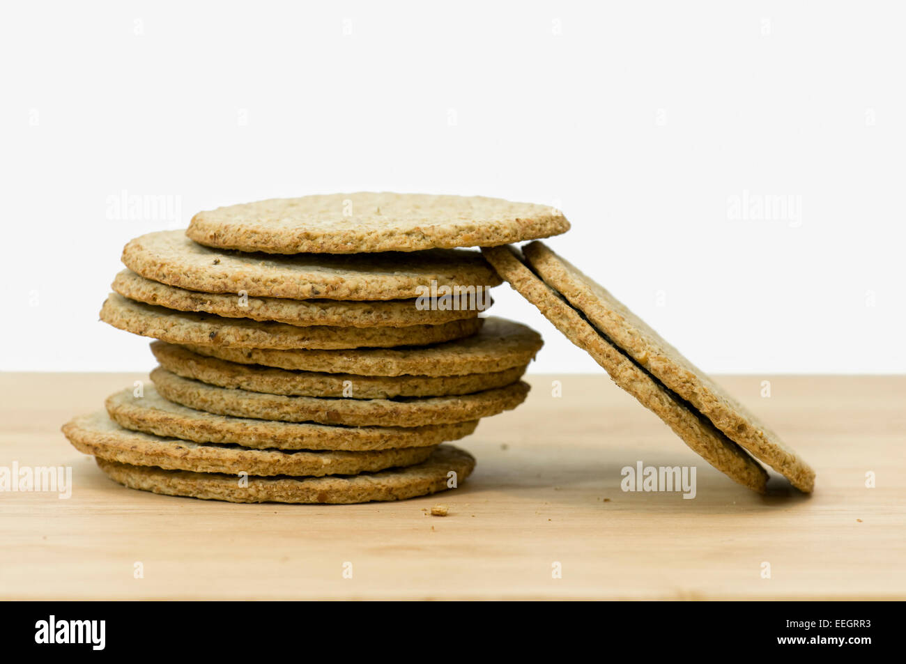 Scottish oatcakes on chopping board Stock Photo