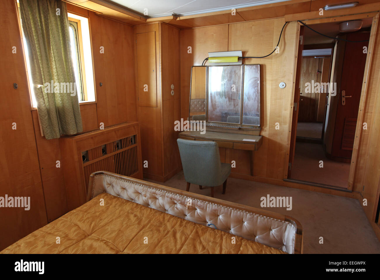 Jovanka Broz sleeping room interior on board of Tito presidential yacht Galeb moored  in the harbor of Rijeka, Croatia. Stock Photo