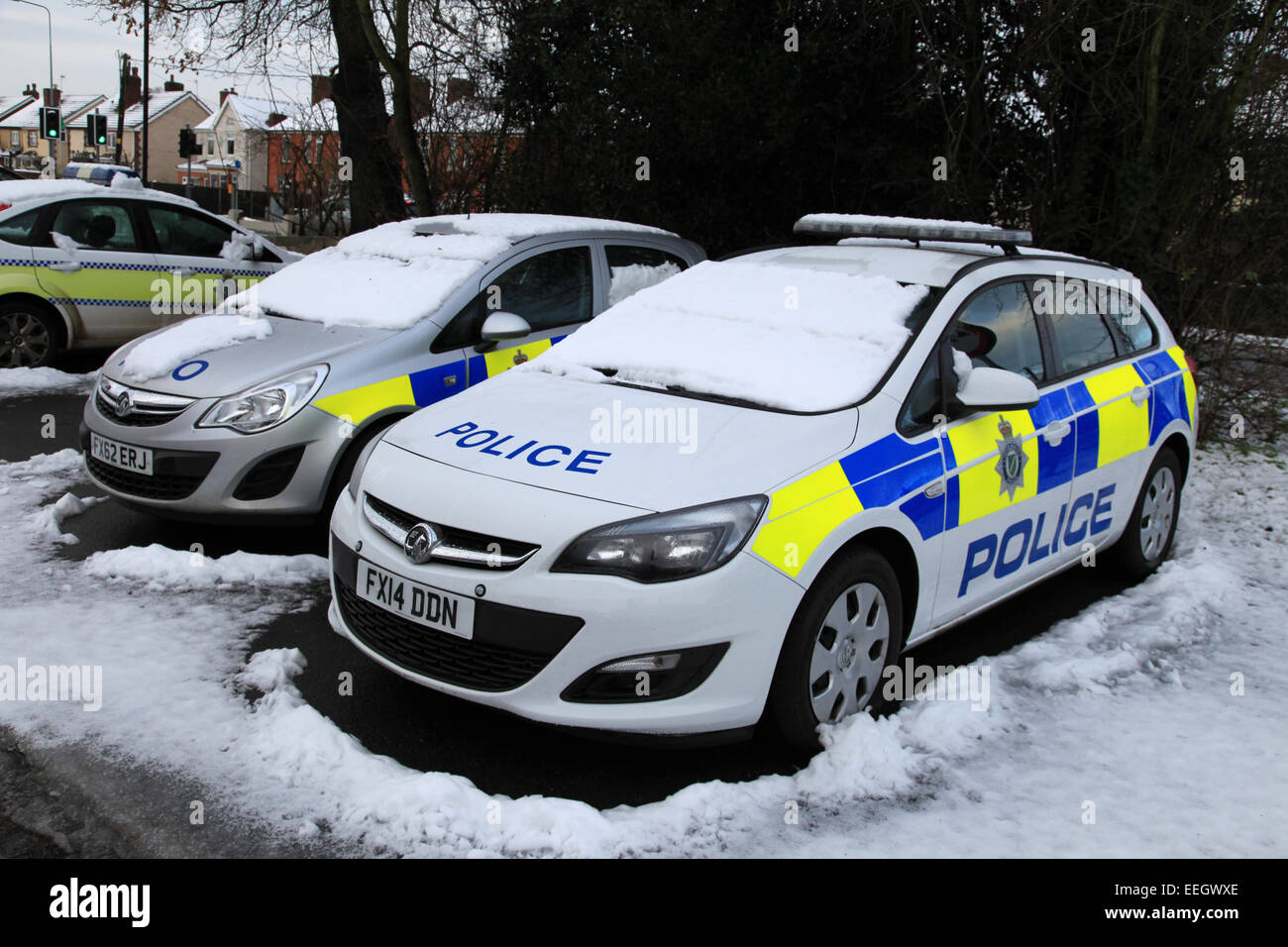 Police Cars In The Snow Vauxhall Mg And Fords Not Much Between Stock Photo Alamy