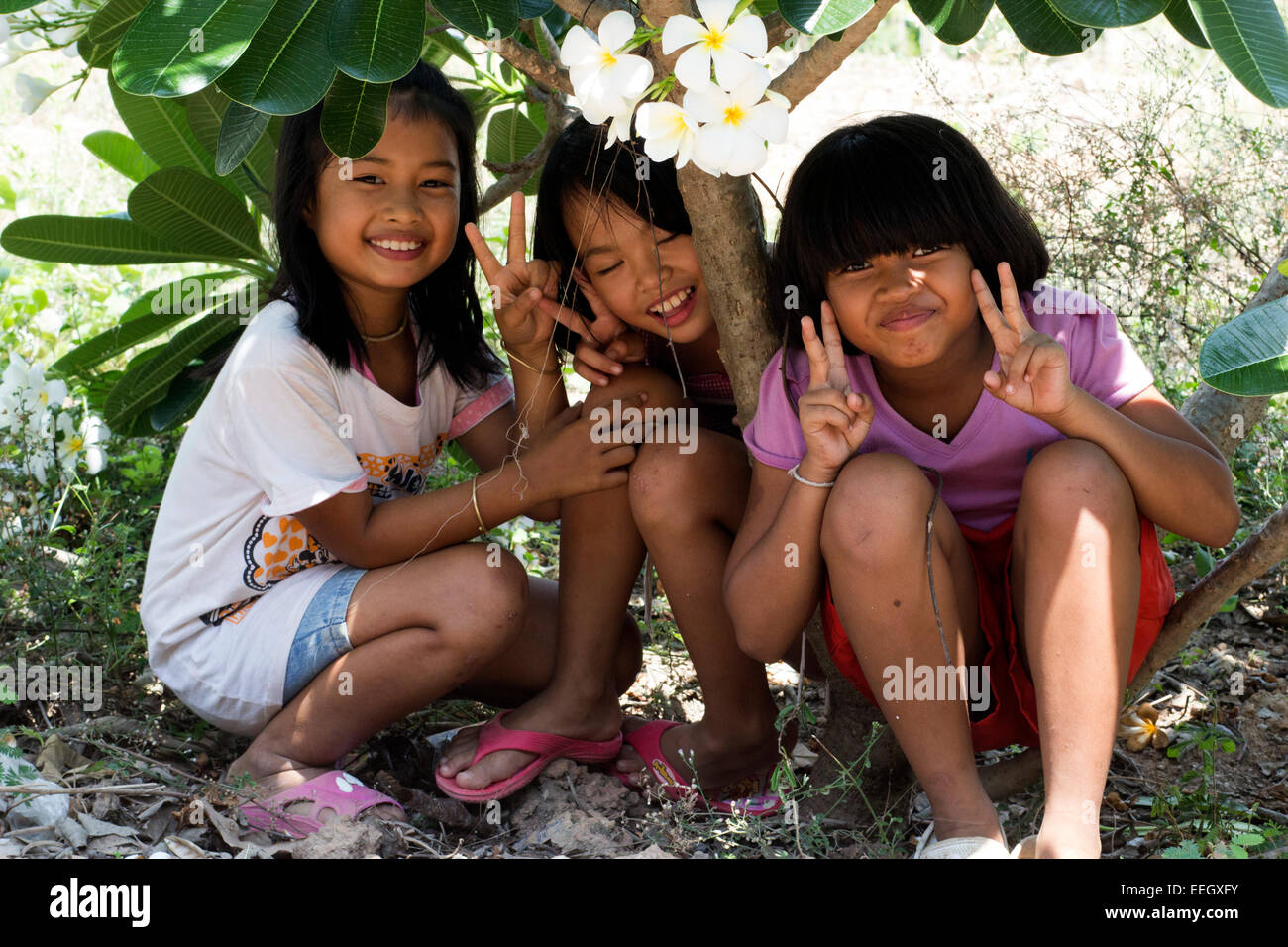 Girls playing in Thailand - Stock Image
