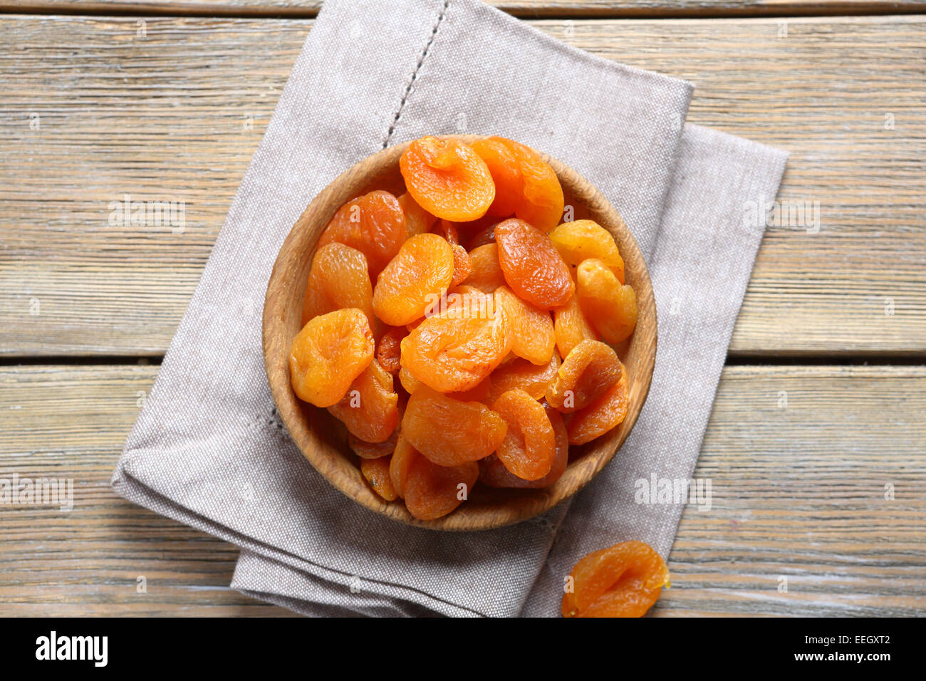 Tasty dried apricots in a bowl, food Stock Photo