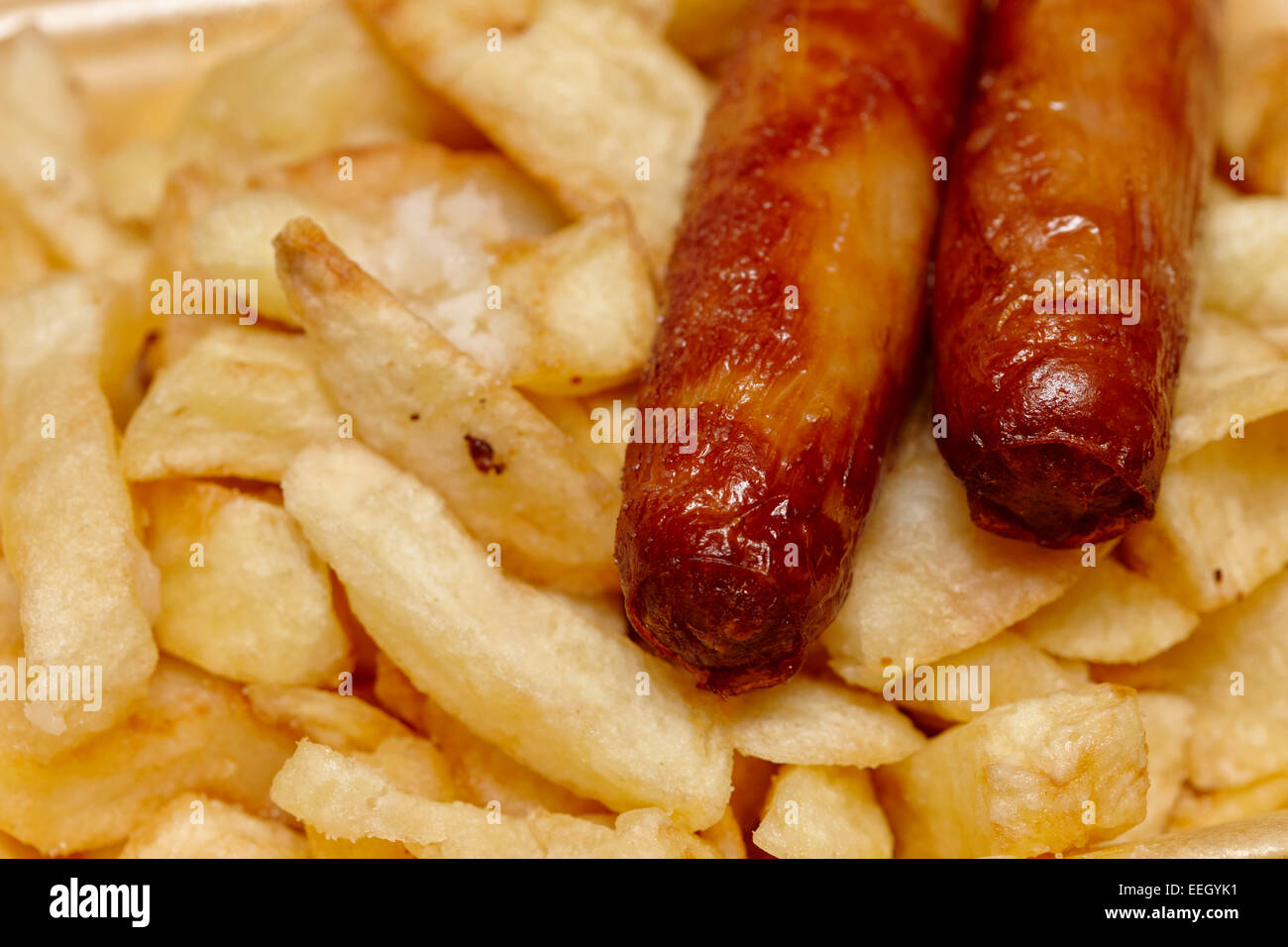 two sausages and chips a sausage supper from a british takeaway Stock Photo