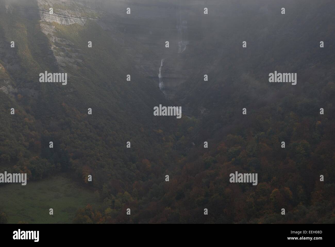 A waterfall in the mountains Stock Photo - Alamy