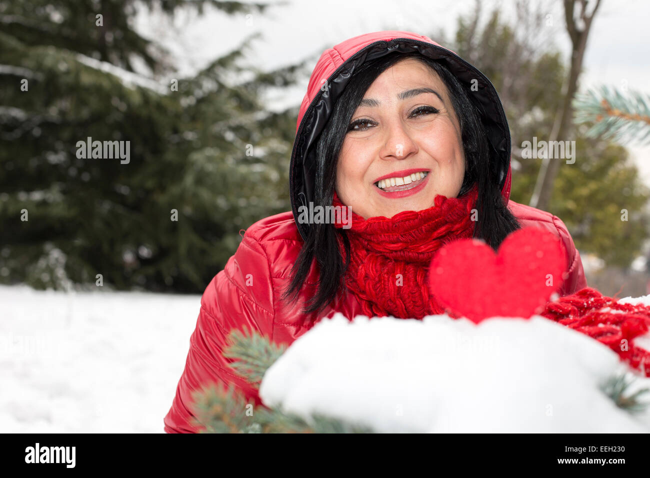 Black Haired Alone Turkish Women Looking At Red Heart And Celebrating