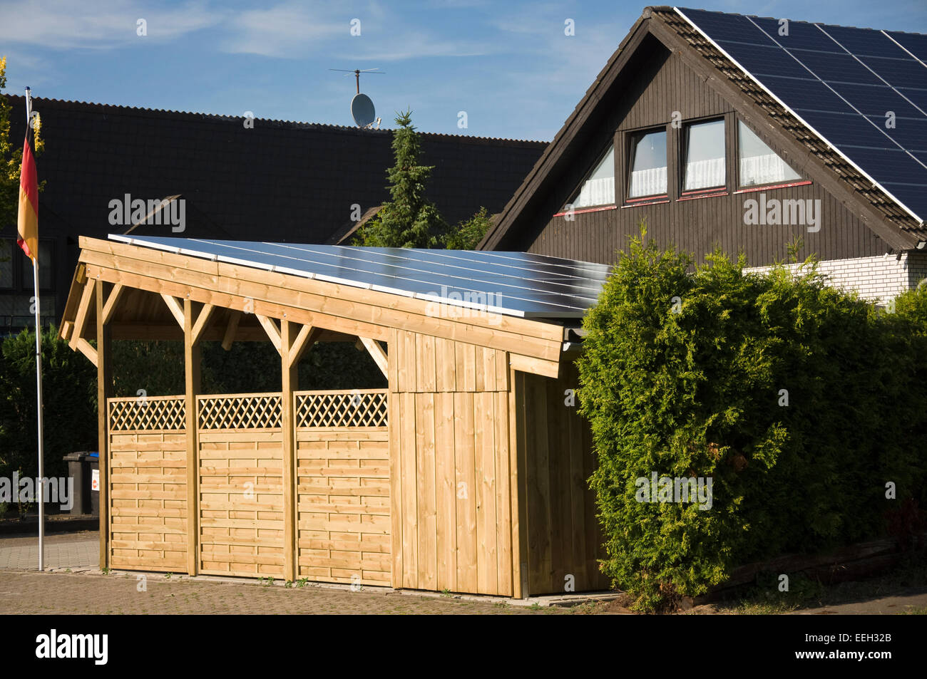 Solar Carport 'Sunport' providing shelter and charging energy for two electric cars or plug-in hybrids  like BMW i8, e-Golf etc. Stock Photo