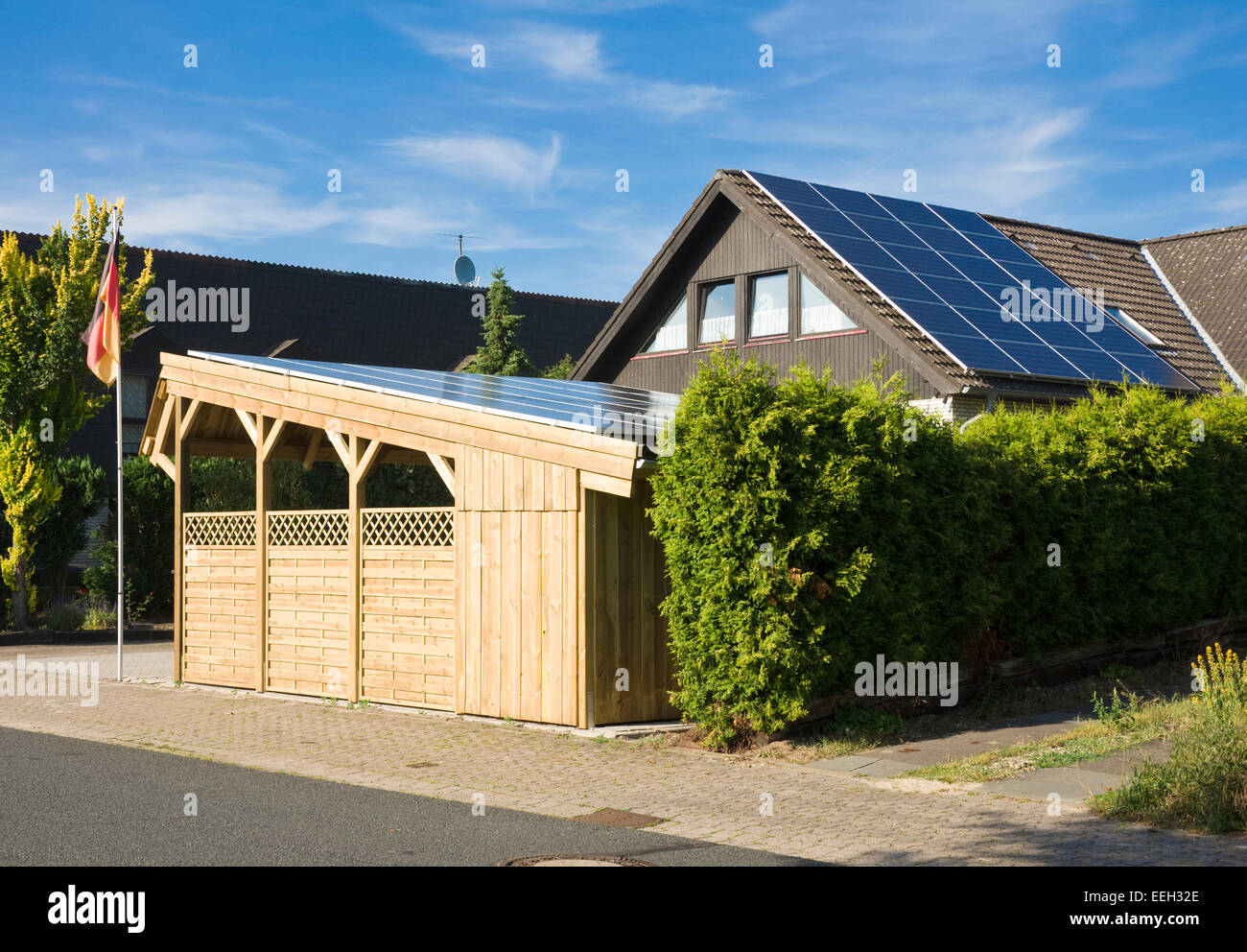 Solar Carport "Sunport" providing shelter and charging energy for two electric cars or plug-in hybrid like BMW i8,  e-Golf etc. Stock Photo