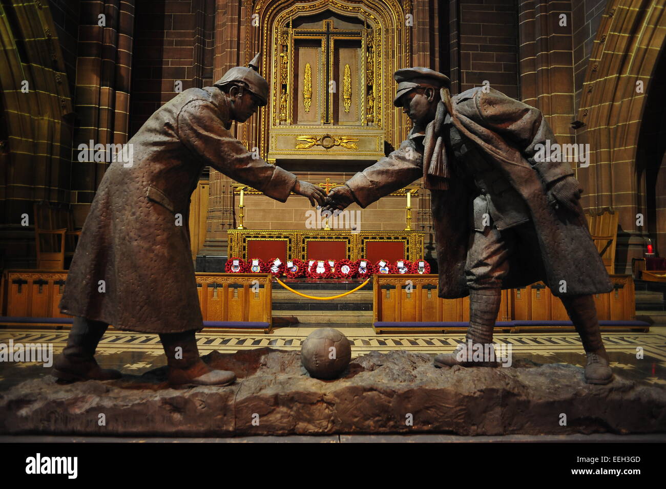 'All Together Now'  by Andy Edwards depicts the Christmas Day truce from WW1 when British & German troops played  football . Stock Photo