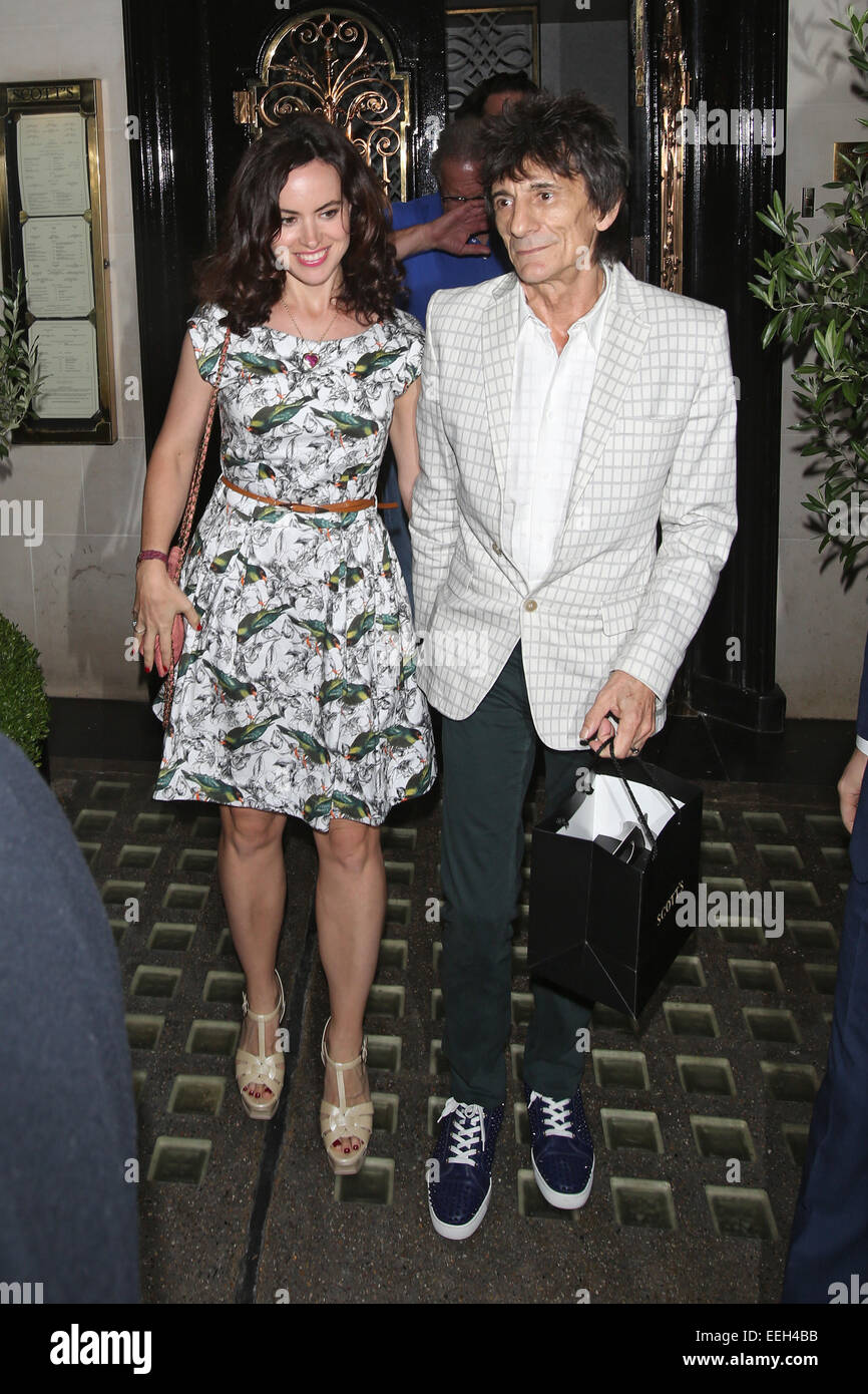 Ronnie Wood Leaving Scotts restaurant in Mayfair  Featuring: Ronnie wood,Sally Humphreys Where: London, United Kingdom When: 17 Jul 2014 Stock Photo