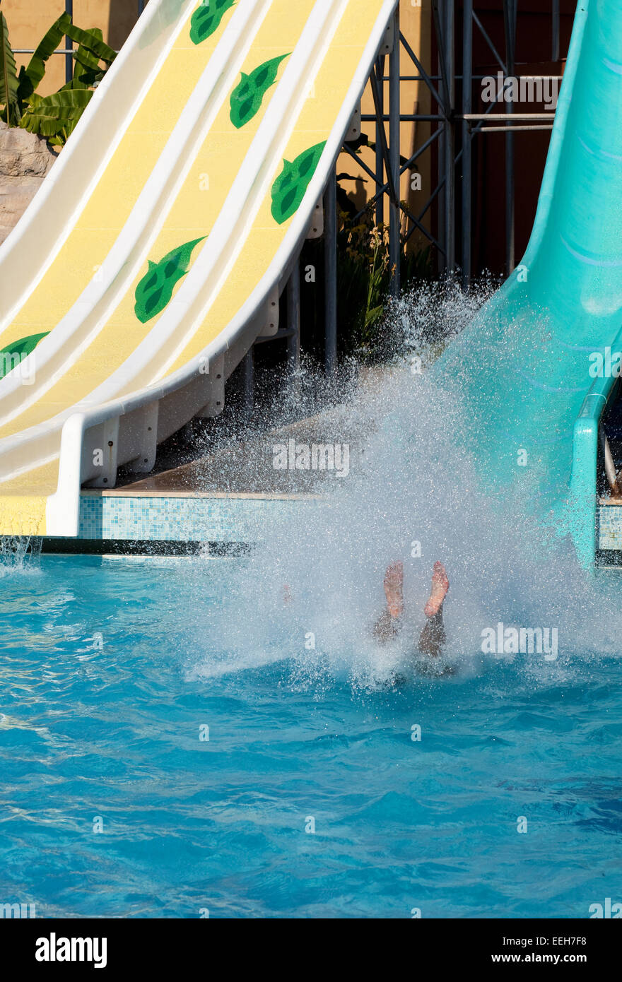 Man riding a water slide Stock Photo Alamy