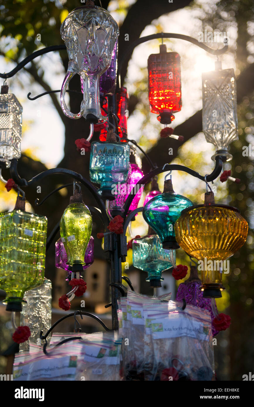 Artistic Crafty Humming Bird Feeders Reflecting Glaring Sunlight