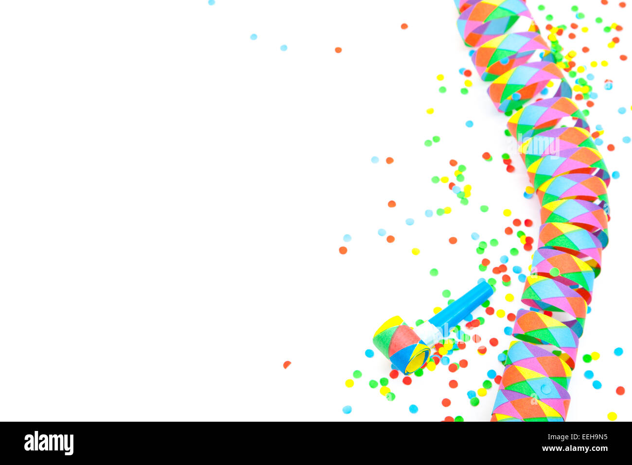 Party streamer and confetti on white background Stock Photo - Alamy