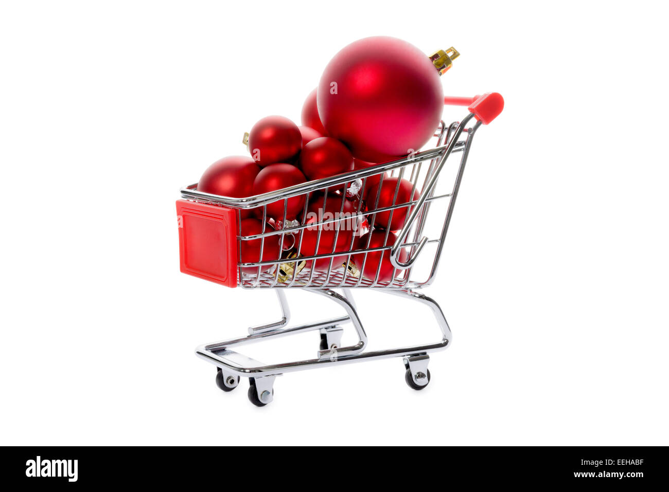 Christmas decorations group of red Christmas balls in a shopping cart