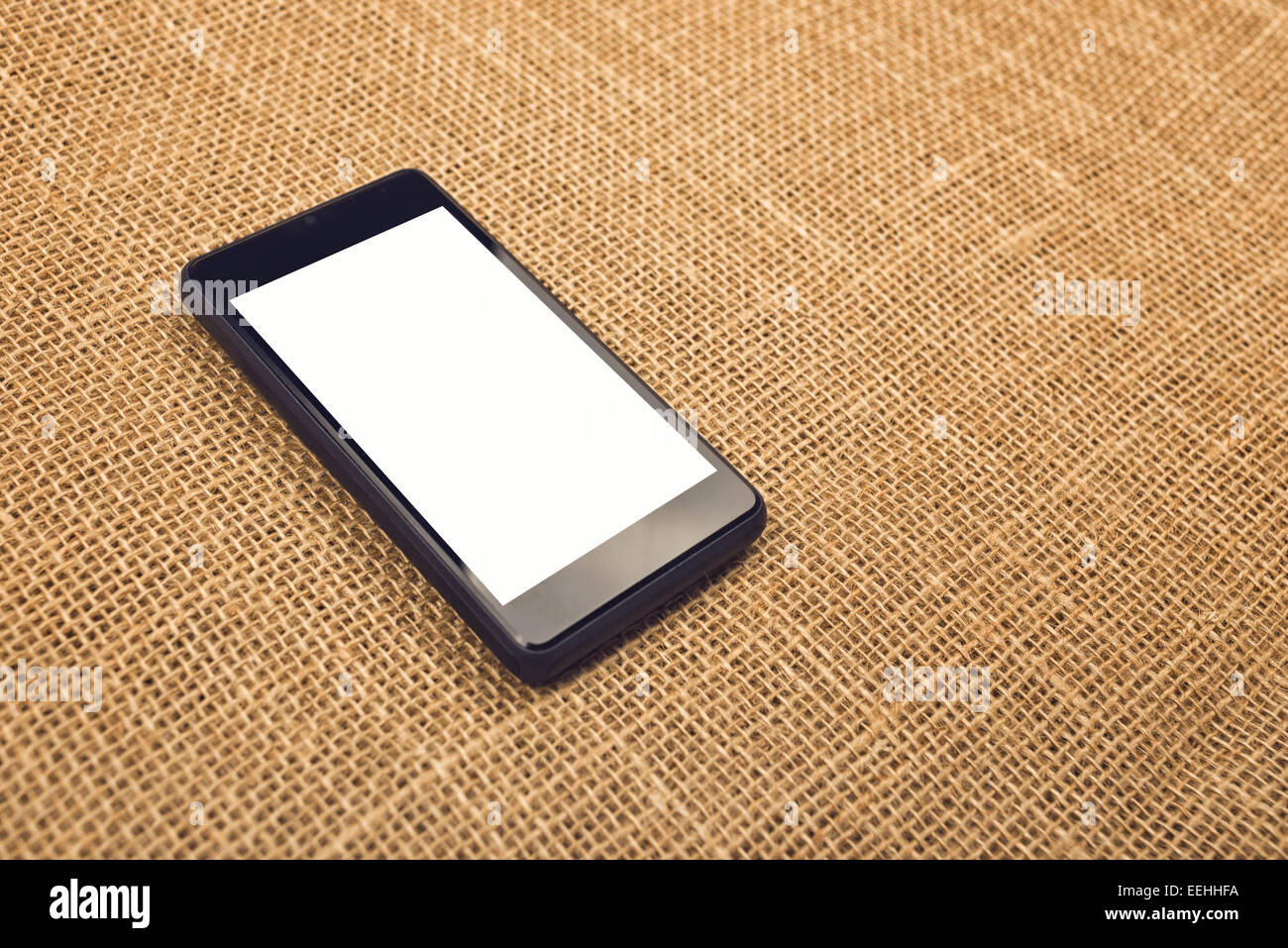 Generic Mobile Smart Phone with Blank White Touch Screen as Copy Space Stock Photo
