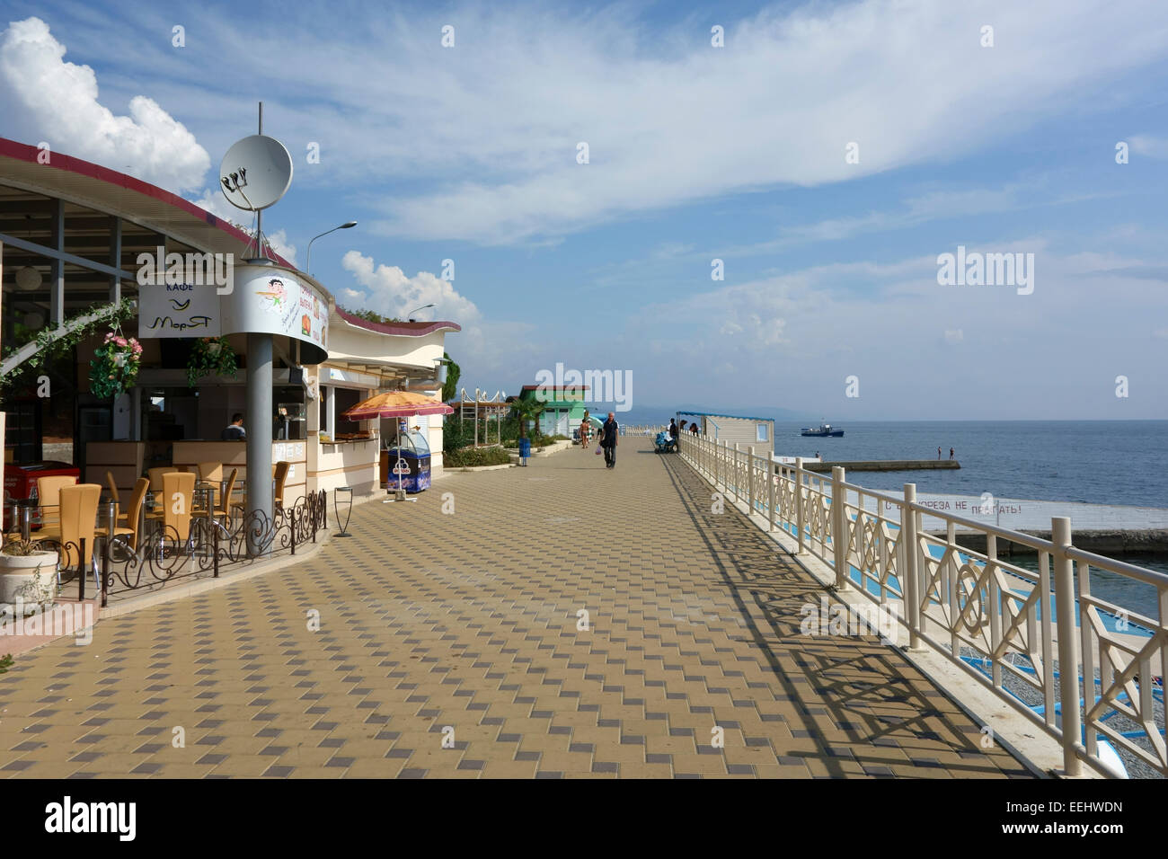 Promenade along waterfront in the resort town of Alushta, Crimea, Russia Stock Photo