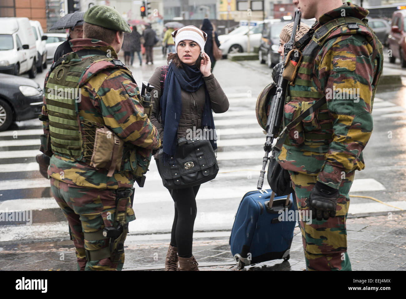 Brussels, Belgium. 19th Jan, 2015. Belgian soldiers stand on guard outside European Union headquarters in Brussels, Belgium on 19.01.2015 Belgian troops were deployed at sensitive sites in Brussels and Antwerp to upgrade security presence after a series of raids on suspected Islamic jihadists in various locations across Belgium with 13 arrests on Thursday evening and two people killed as part of a raid on a premise in the eastern town of Verviers. Another 150 troops will be deployed next week, as local media reports. Credit:  dpa picture alliance/Alamy Live News Stock Photo