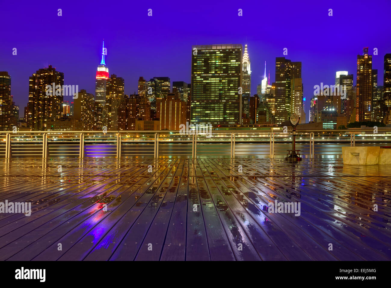 Manhattan New York skyline at sunset rainy dusk from East River NYC USA ...