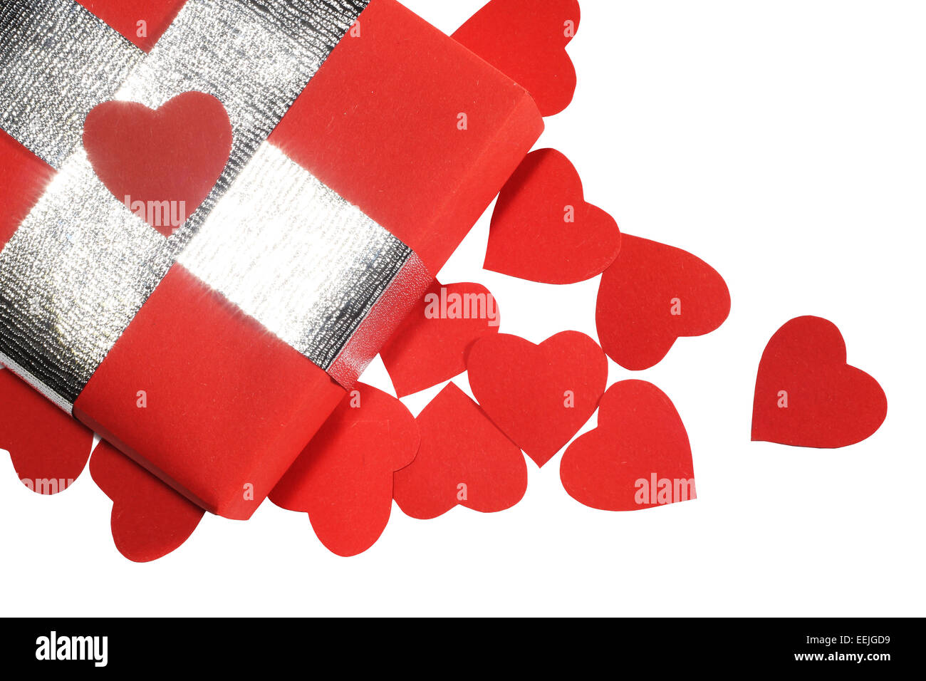 Valentines Day gift in red box and small hearts isolated on white top ...