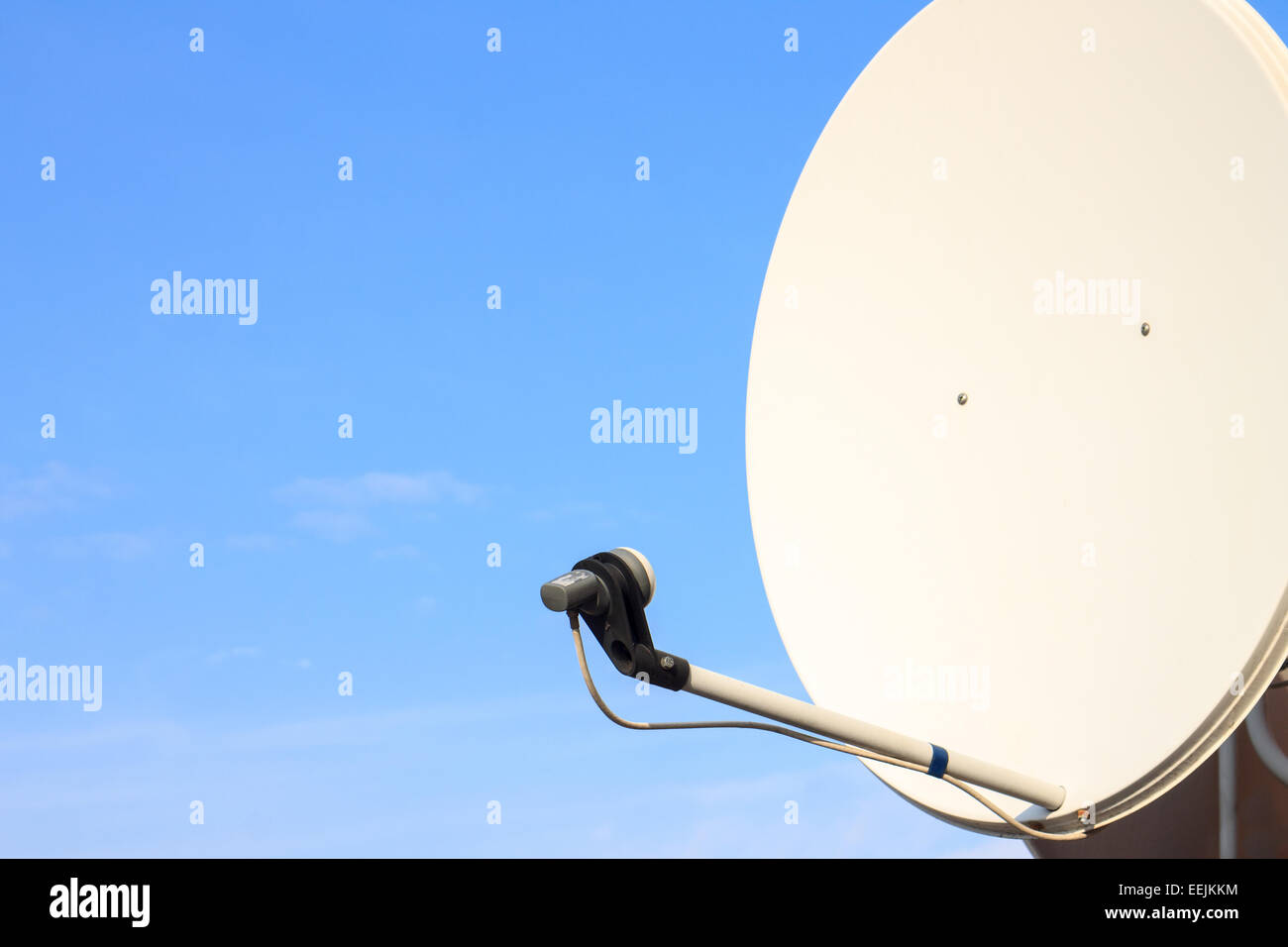 Satellite dish antenna on summer blue sky Stock Photo