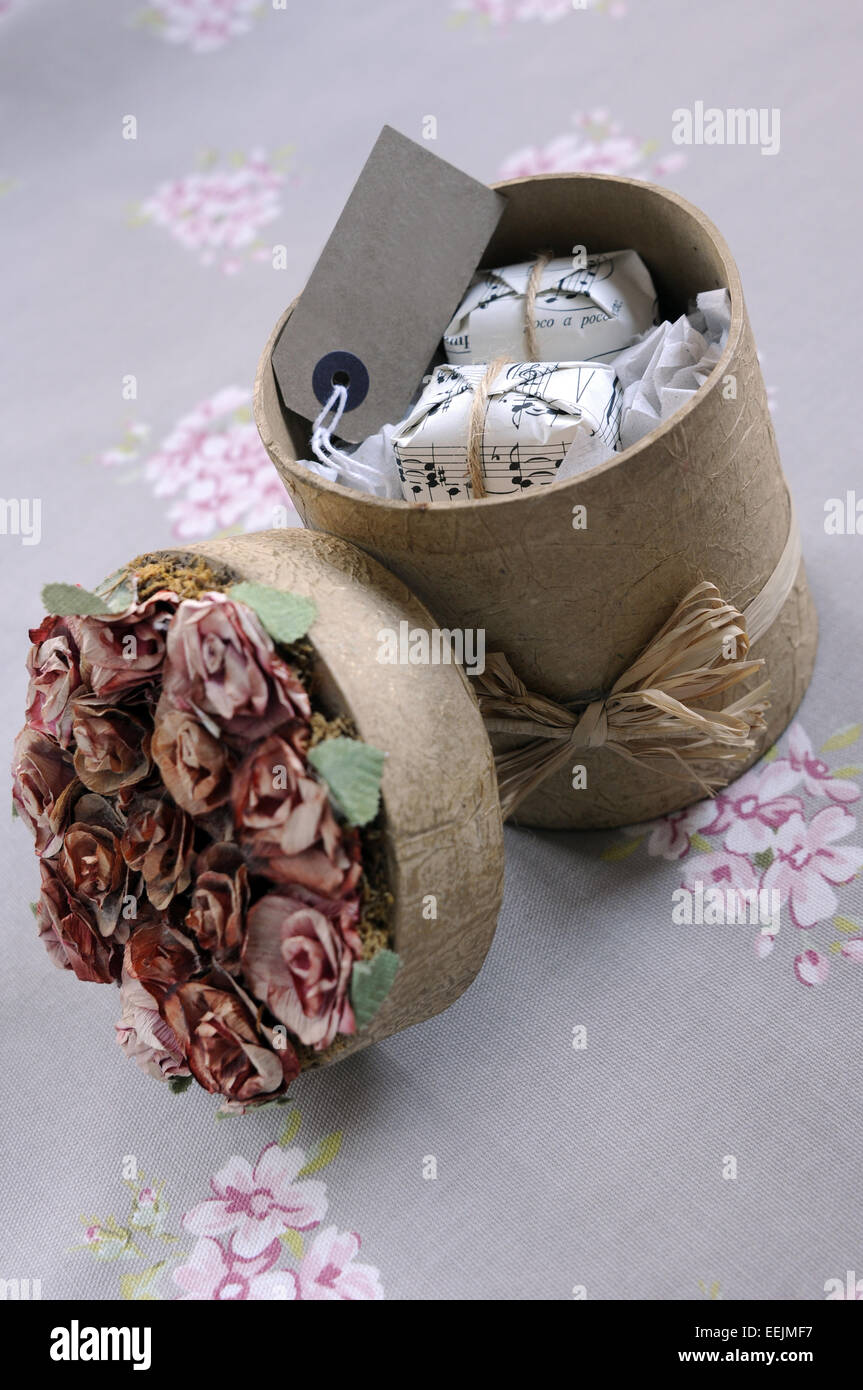 pretty round vintage style gift box with presents Stock Photo
