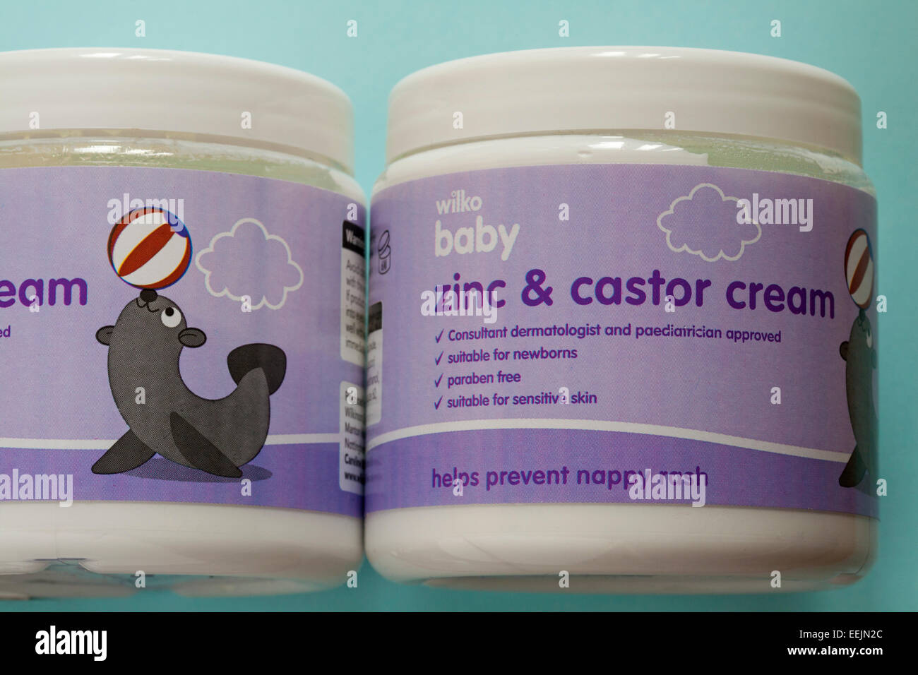 tubs of Wilko baby zinc and castor cream  set on pale blue background Stock Photo
