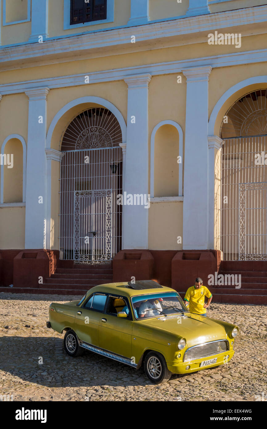 1957 Ford Consul outside the Church of the Holy Trinity, Trinidad, Cuba. Stock Photo