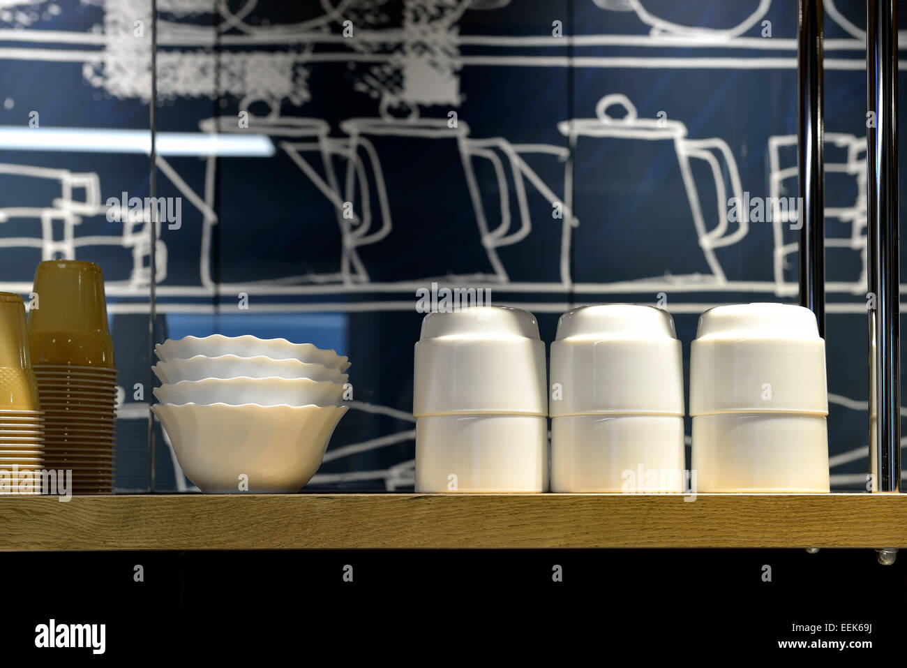 Stacks of dishes and bowls on shelves in Stock Photo Alamy