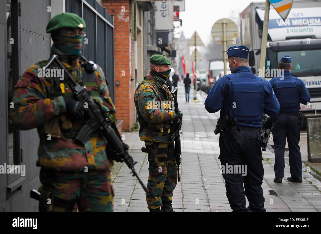 Brussels, Belgium. 19th Jan, 2015. Belgian soldiers and police patrol outside a Jewish school in Brussels, capital of Belgium, on Jan. 19, 2015. Greek police announced on Monday a 33-year-old Algerian national, who was arrested on Sunday in Athens on charges of planning terrorist activity in Belgium, will be deported to Brussels. Two more searches took place in Brussels on Sunday. According to a spokesperson of the Federal prosecutor, no arrests were made. Credit:  Zhou Lei/Xinhua/Alamy Live News Stock Photo