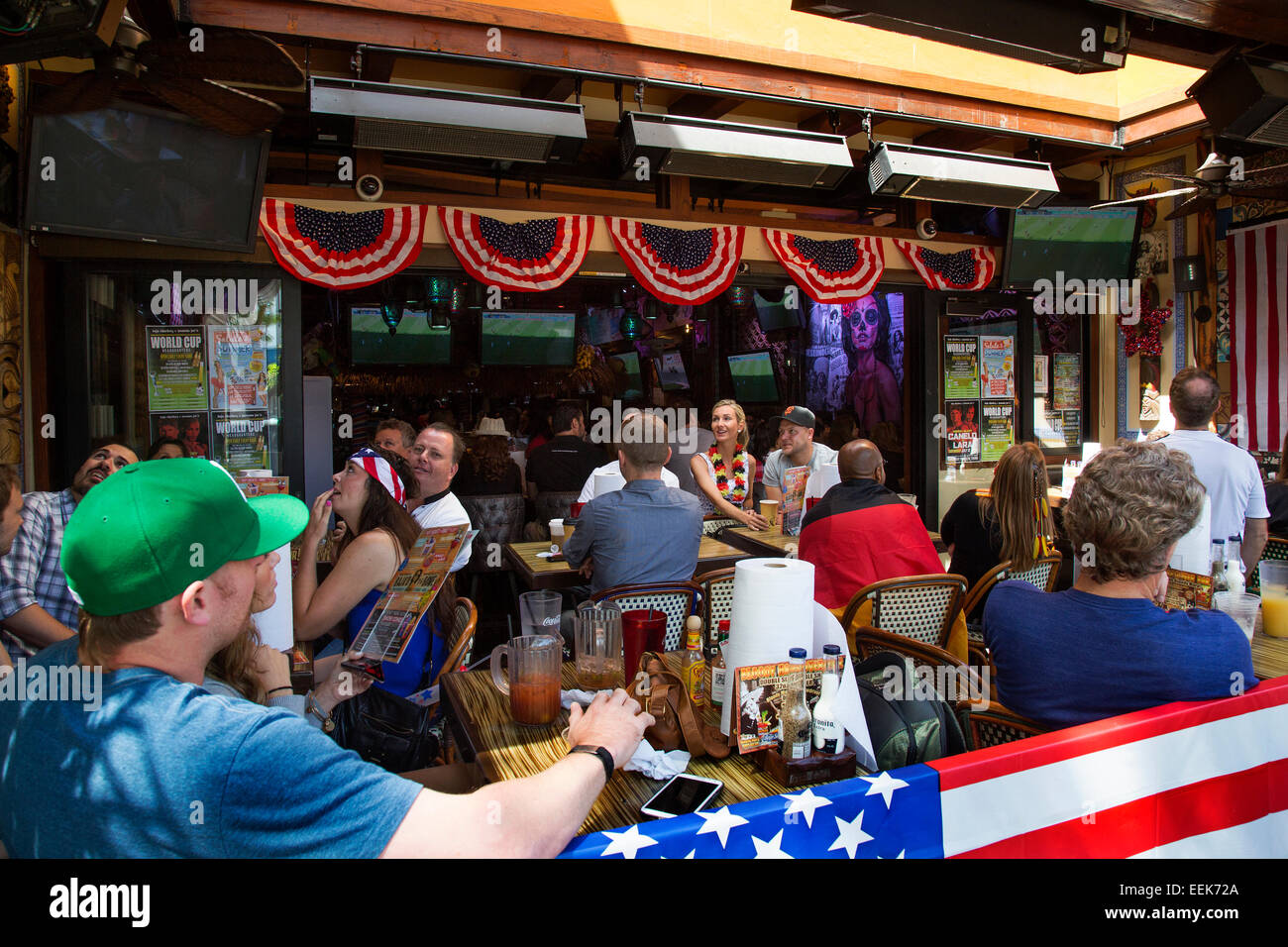 Football Fans watching the World Cup of Football in a Santa Barbara bar, California, USA Stock Photo