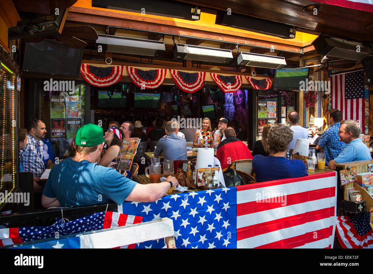 Football Fans watching the World Cup of Football in a Santa Barbara bar, California Stock Photo