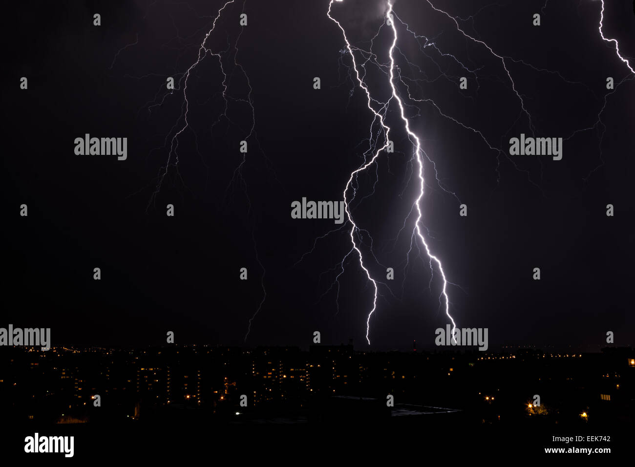 lightning storm over city Stock Photo - Alamy