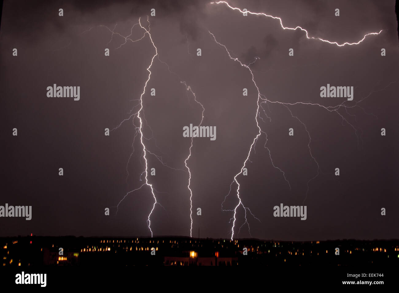 lightning storm over city Stock Photo - Alamy